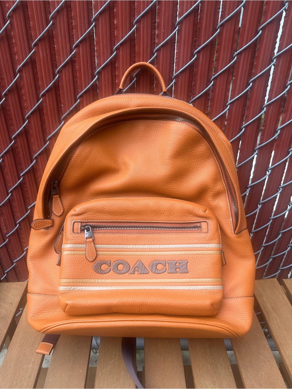 Coach Orange Leather Backpack with Front Logo Pocket